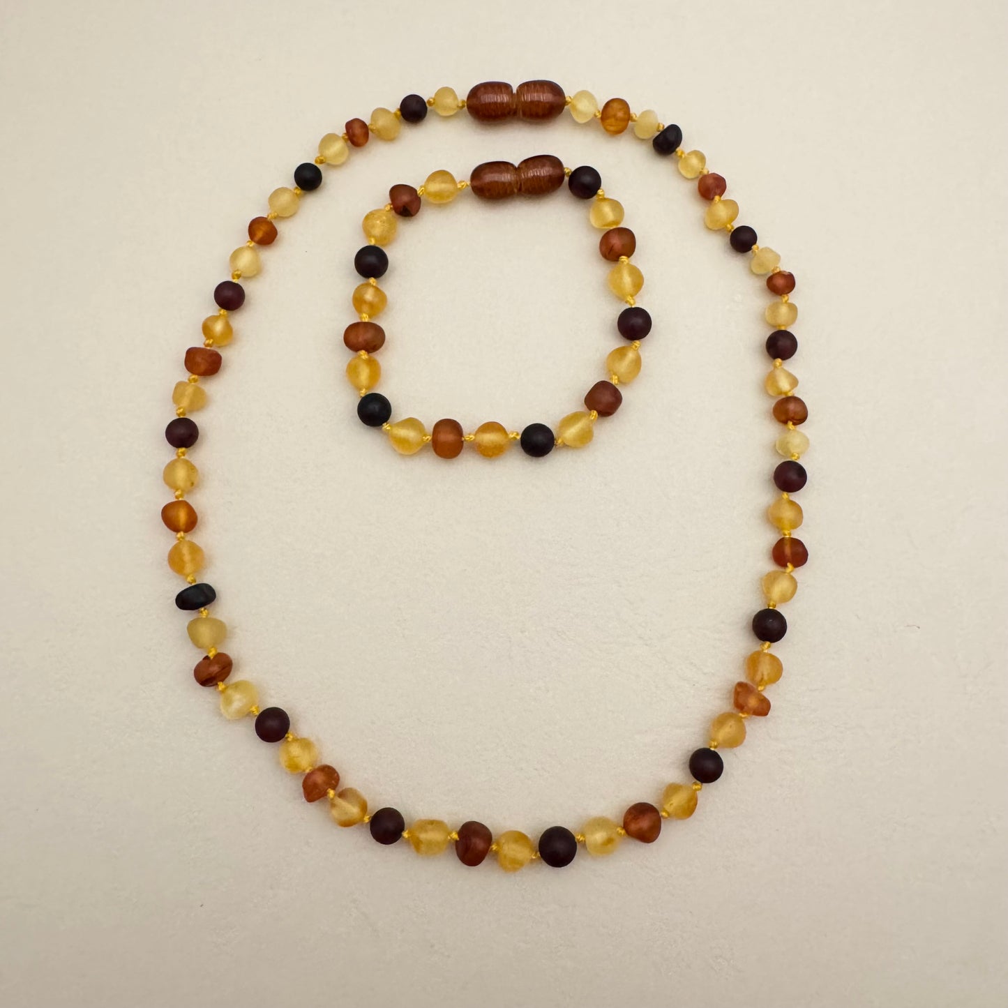Ambre - Collier et Bracelet pour bébé