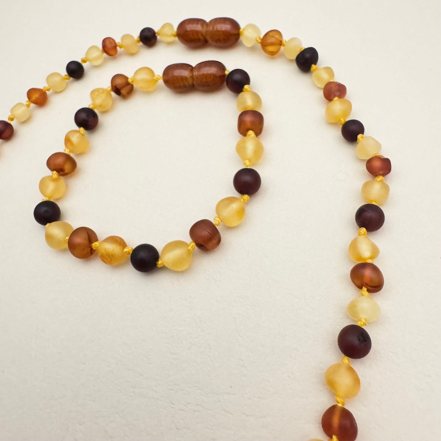 Ambre - Collier et Bracelet pour bébé