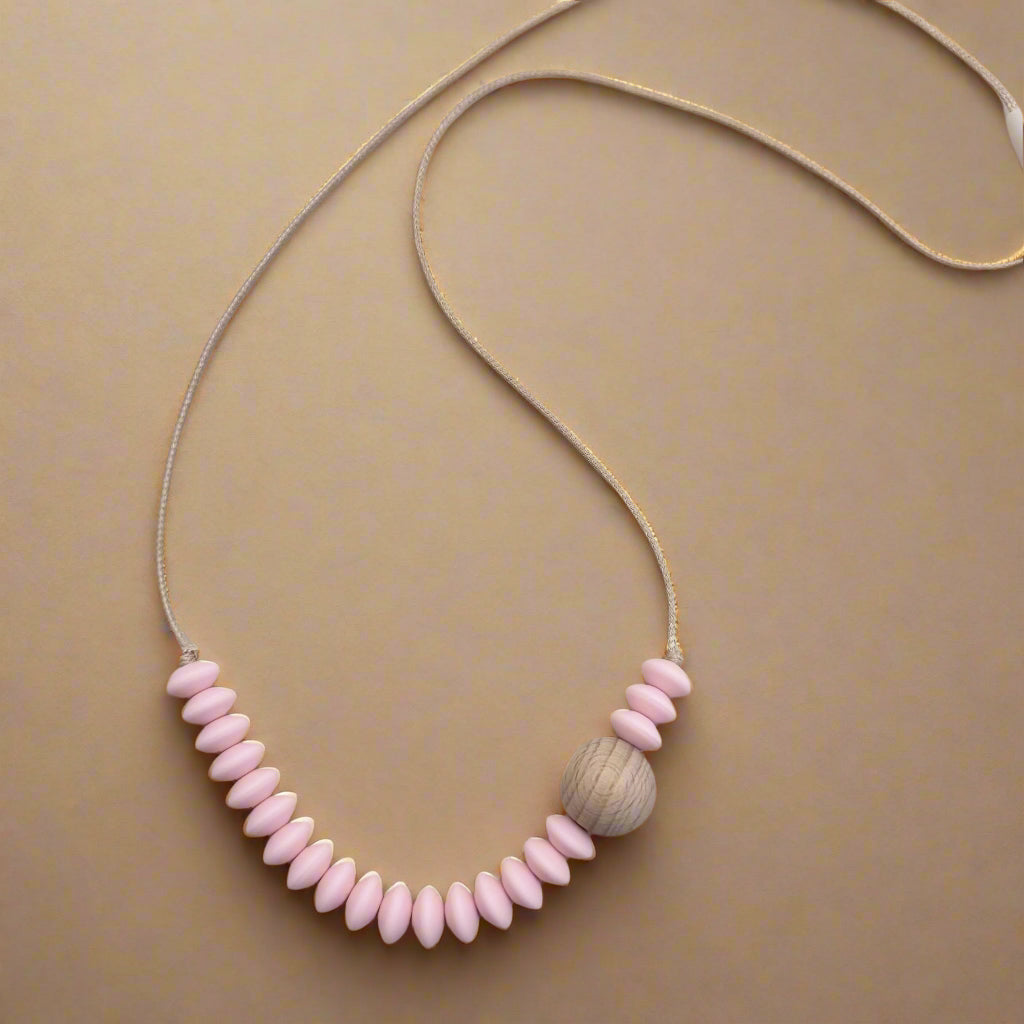 collier de portage bébé naturel