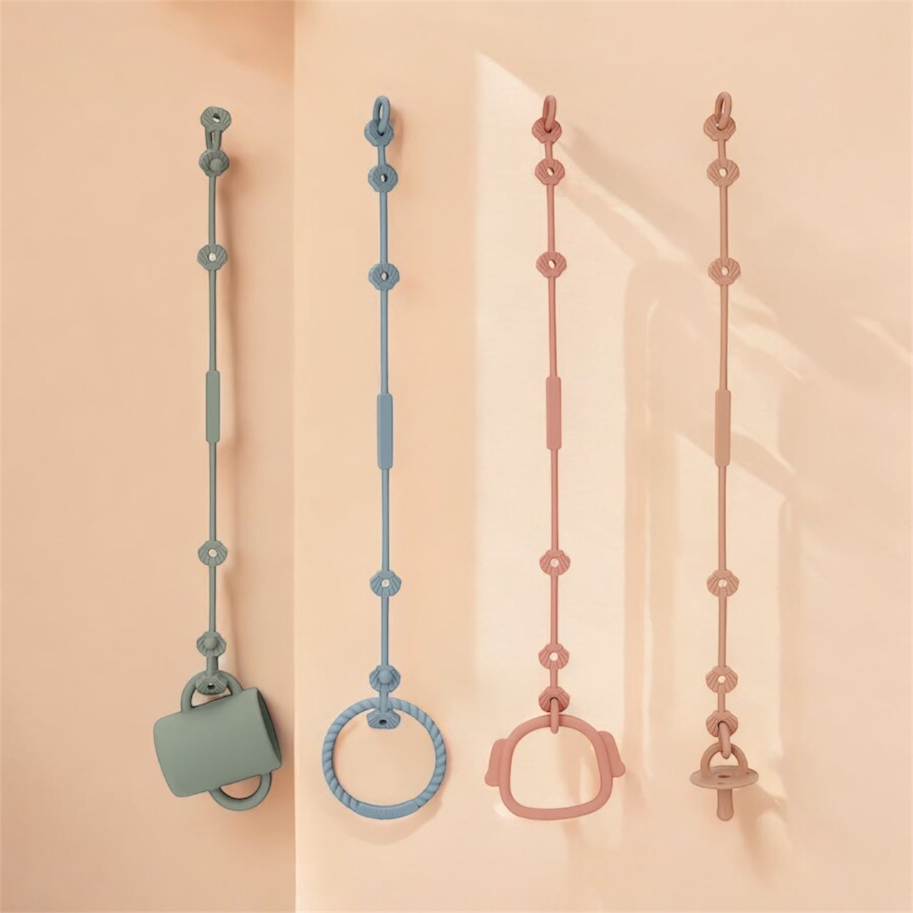 Attache silicone bébé pour éviter les chutes de jouets,