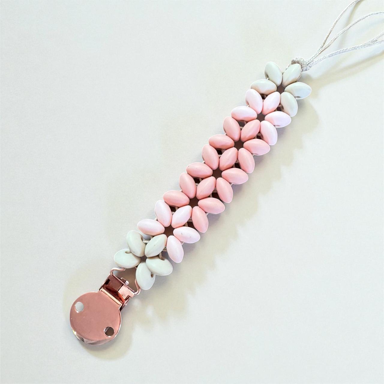 attache tetine fleur rose