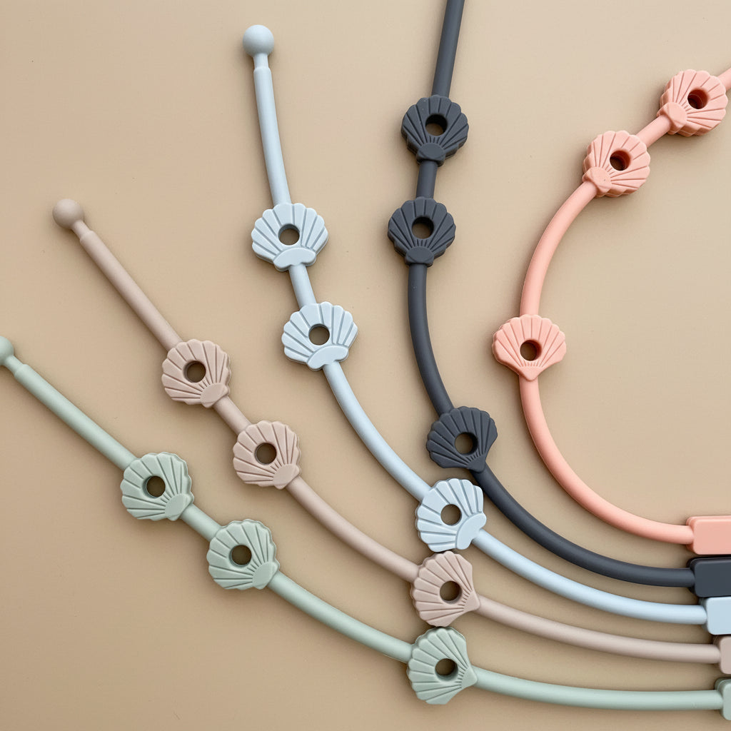 attache silicone multifonction pour poussette, design coquillages